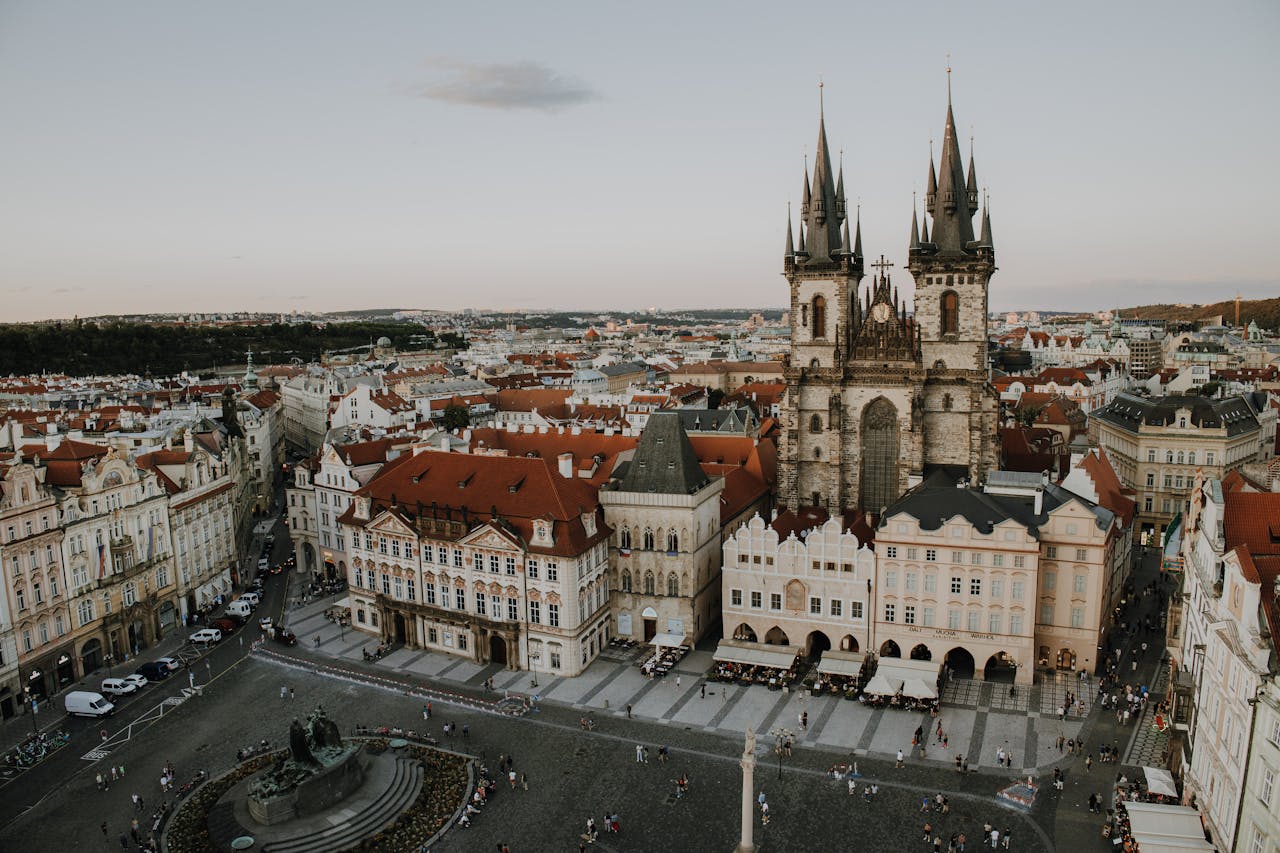 Captured from above, this image showcases Prague's iconic Old Town Square with historic architecture.