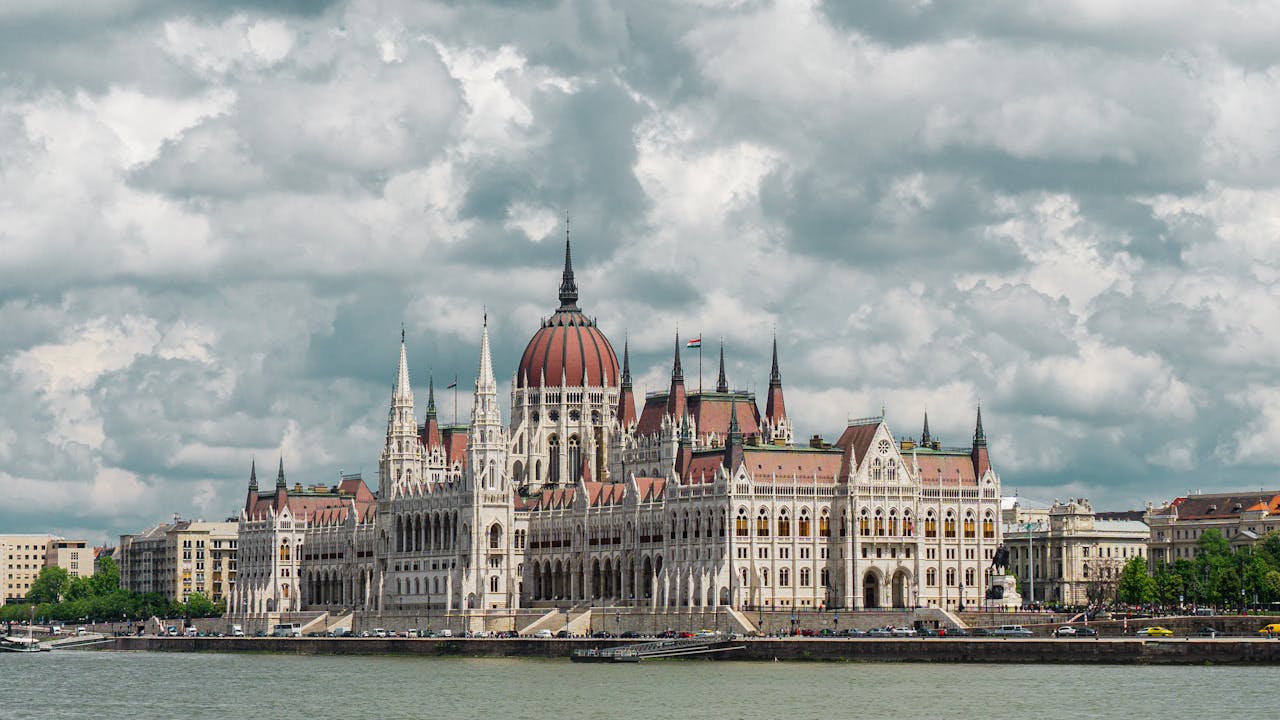 Stunning view of the Hungarian Parliament Building along the Danube River in Budapest.